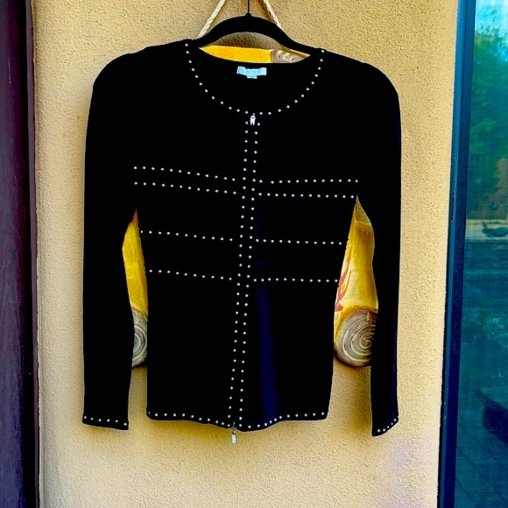 Black stretchy material 3/4 sleeve top with silver grommets